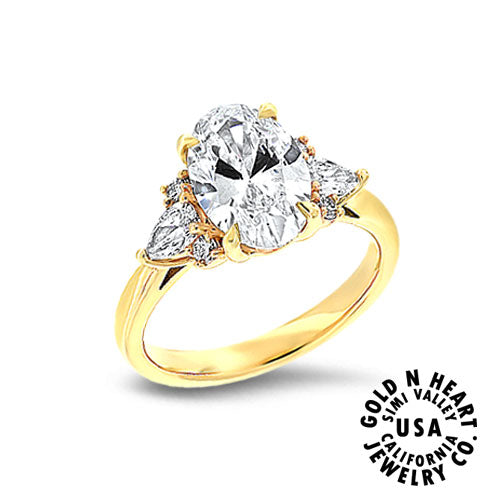 Oval-cut Center Framed by Matching Pear Shape Diamonds Engagement Ring